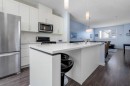 100 Copperstone Villas Se, Calgary, AB  - Indoor Photo Showing Kitchen With Upgraded Kitchen 