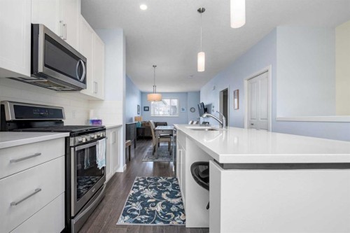 100 Copperstone Villas Se, Calgary, AB - Indoor Photo Showing Kitchen With Upgraded Kitchen