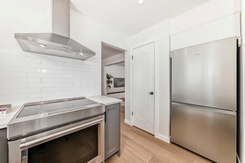 9611 Palisan Place Sw, Calgary, AB - Indoor Photo Showing Kitchen