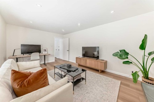 9611 Palisan Place Sw, Calgary, AB - Indoor Photo Showing Living Room