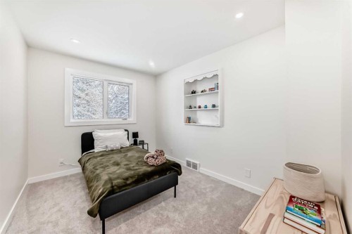 9611 Palisan Place Sw, Calgary, AB - Indoor Photo Showing Bedroom