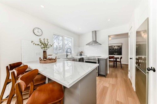 9611 Palisan Place Sw, Calgary, AB - Indoor Photo Showing Kitchen With Upgraded Kitchen