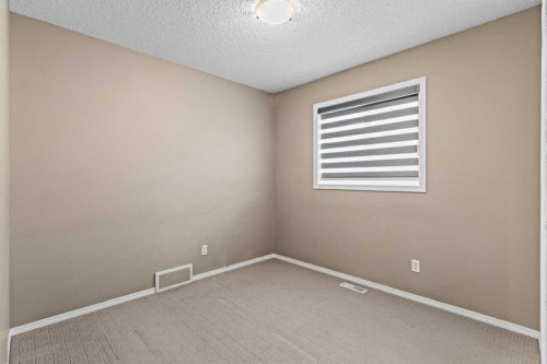 138 Saddlecrest Park Ne, Calgary, AB - Indoor Photo Showing Other Room