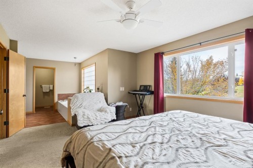 120 Simcoe Close Sw, Calgary, AB - Indoor Photo Showing Bedroom