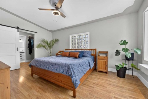 64 Foxwell Road Se, Calgary, AB - Indoor Photo Showing Bedroom