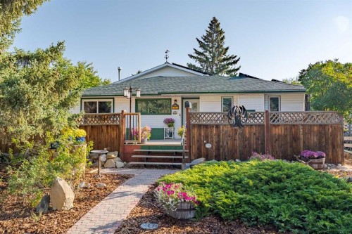 64 Foxwell Road Se, Calgary, AB - Outdoor With Deck Patio Veranda