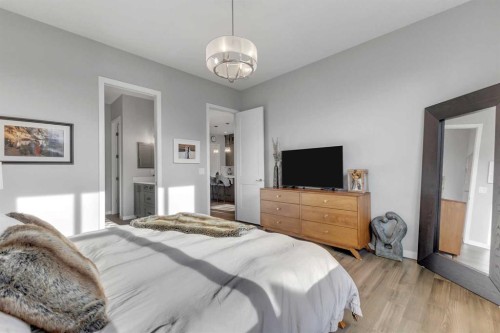 1195 Cranbrook Gardens Se, Calgary, AB - Indoor Photo Showing Bedroom