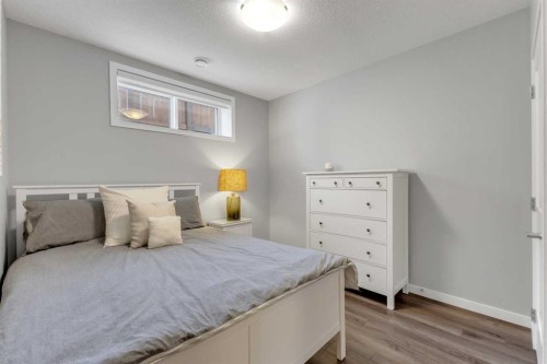 1195 Cranbrook Gardens Se, Calgary, AB - Indoor Photo Showing Bedroom