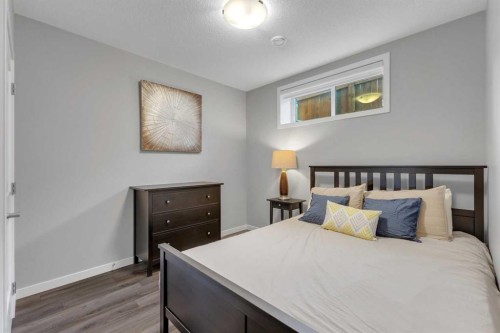 1195 Cranbrook Gardens Se, Calgary, AB - Indoor Photo Showing Bedroom