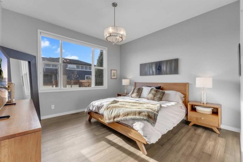 1195 Cranbrook Gardens Se, Calgary, AB - Indoor Photo Showing Bedroom