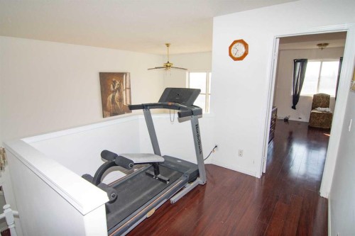 47 Anaheim Crescent, Calgary, AB - Indoor Photo Showing Gym Room