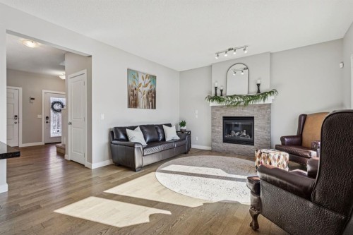 259 Canals Close Sw, Airdrie, AB - Indoor Photo Showing Living Room With Fireplace