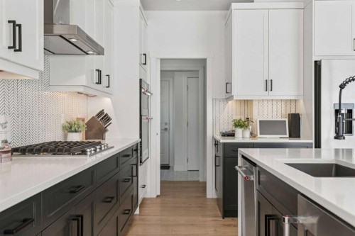 119 Riviera View, Cochrane, AB - Indoor Photo Showing Kitchen With Upgraded Kitchen