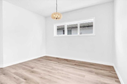 1014 Limit Avenue, Crossfield, AB - Indoor Photo Showing Other Room