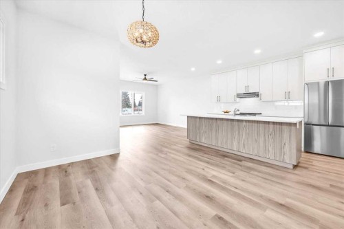 1014 Limit Avenue, Crossfield, AB - Indoor Photo Showing Kitchen