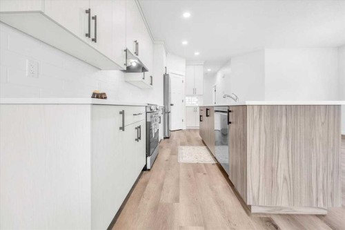 1014 Limit Avenue, Crossfield, AB - Indoor Photo Showing Kitchen