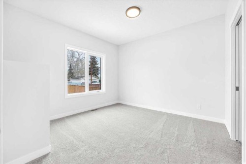 1014 Limit Avenue, Crossfield, AB - Indoor Photo Showing Other Room