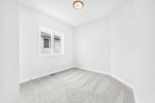 1014 Limit Avenue, Crossfield, AB - Indoor Photo Showing Other Room