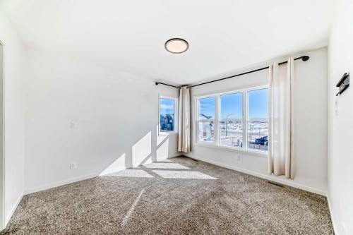 120 Seton Villas Se, Calgary, AB - Indoor Photo Showing Other Room