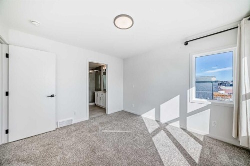 120 Seton Villas Se, Calgary, AB - Indoor Photo Showing Other Room