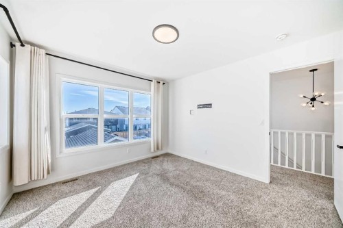 120 Seton Villas Se, Calgary, AB - Indoor Photo Showing Other Room