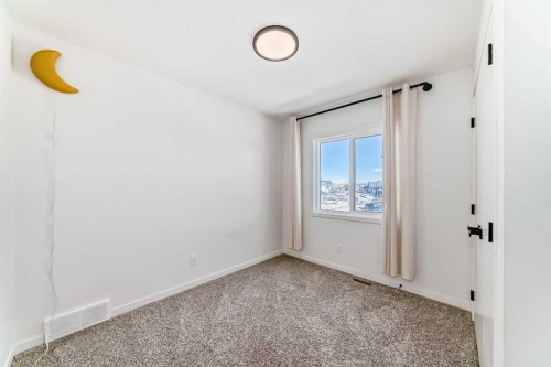 120 Seton Villas Se, Calgary, AB - Indoor Photo Showing Other Room