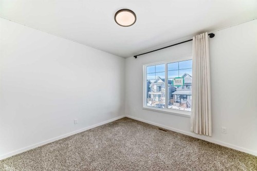 120 Seton Villas Se, Calgary, AB - Indoor Photo Showing Other Room