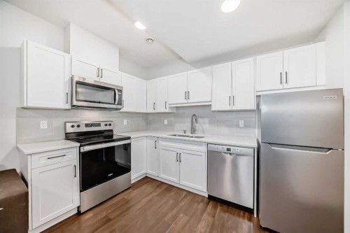 120 Seton Villas Se, Calgary, AB - Indoor Photo Showing Kitchen With Stainless Steel Kitchen With Upgraded Kitchen