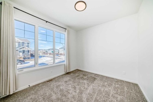 120 Seton Villas Se, Calgary, AB - Indoor Photo Showing Other Room