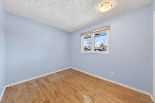 215 Pinegrove Close Ne, Calgary, AB - Indoor Photo Showing Other Room