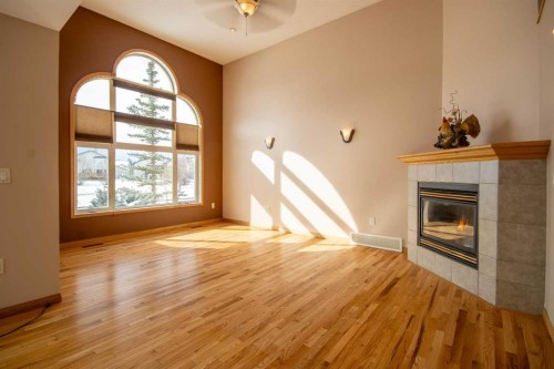 5111 Shannon Drive, Olds, AB - Indoor Photo Showing Other Room With Fireplace