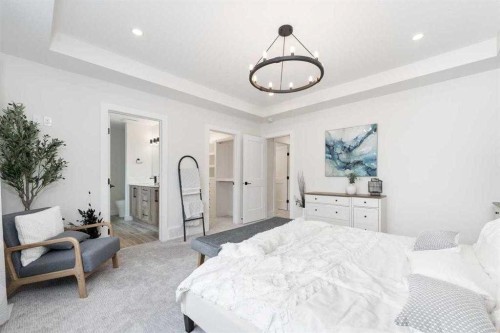 524 Waterford Grove, Chestermere, AB - Indoor Photo Showing Bedroom