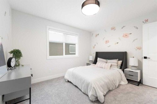 524 Waterford Grove, Chestermere, AB - Indoor Photo Showing Bedroom