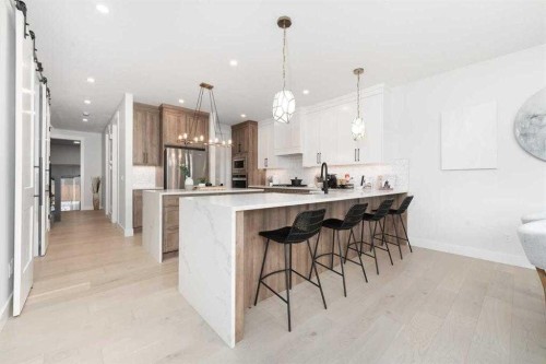 524 Waterford Grove, Chestermere, AB - Indoor Photo Showing Kitchen With Upgraded Kitchen