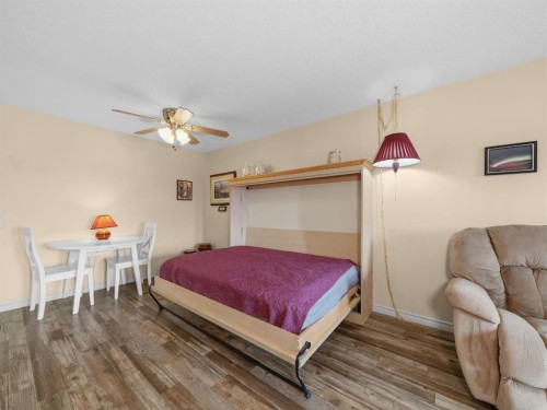3208 Millrise Point Sw, Calgary, AB - Indoor Photo Showing Bedroom