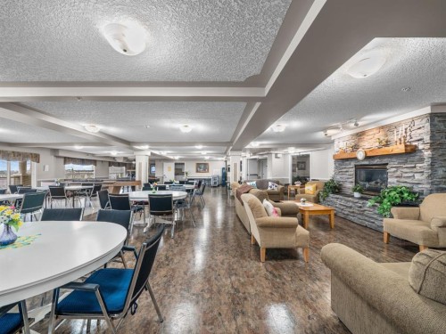 3208 Millrise Point Sw, Calgary, AB - Indoor With Fireplace