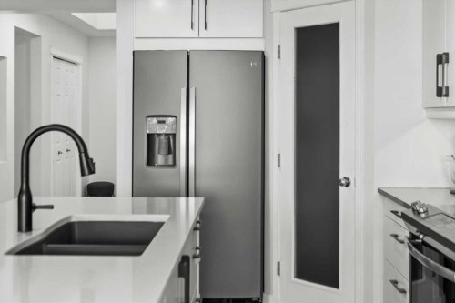 218 Coville Circle Ne, Calgary, AB - Indoor Photo Showing Kitchen With Double Sink