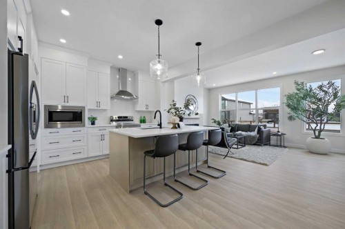 15 Fireside Common, Cochrane, AB - Indoor Photo Showing Kitchen With Stainless Steel Kitchen With Upgraded Kitchen