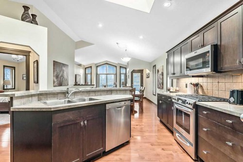 263 Willow Ridge Manor Sw, Diamond Valley, AB - Indoor Photo Showing Kitchen With Double Sink With Upgraded Kitchen