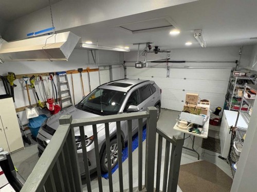 263 Willow Ridge Manor Sw, Diamond Valley, AB - Indoor Photo Showing Garage