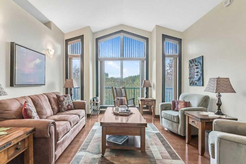 263 Willow Ridge Manor Sw, Diamond Valley, AB - Indoor Photo Showing Living Room