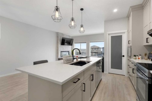 22 Edith Manor Nw, Calgary, AB - Indoor Photo Showing Kitchen With Double Sink With Upgraded Kitchen