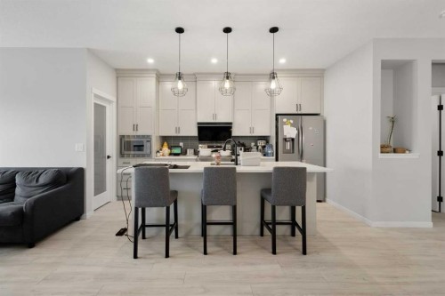 22 Edith Manor Nw, Calgary, AB - Indoor Photo Showing Kitchen With Upgraded Kitchen