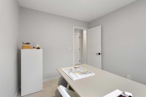 22 Edith Manor Nw, Calgary, AB - Indoor Photo Showing Other Room