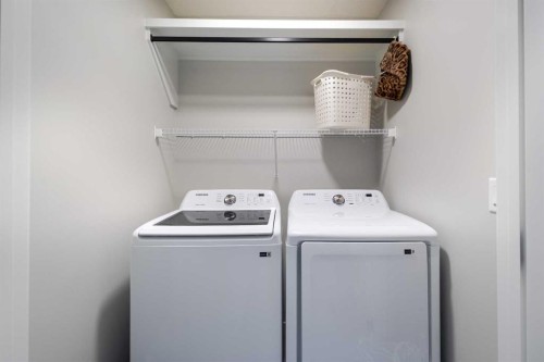 22 Edith Manor Nw, Calgary, AB - Indoor Photo Showing Laundry Room