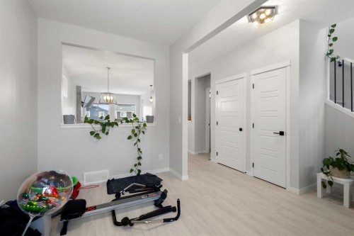 22 Edith Manor Nw, Calgary, AB - Indoor Photo Showing Other Room