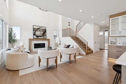 6 Westmount Point, Okotoks, AB - Indoor Photo Showing Other Room With Fireplace