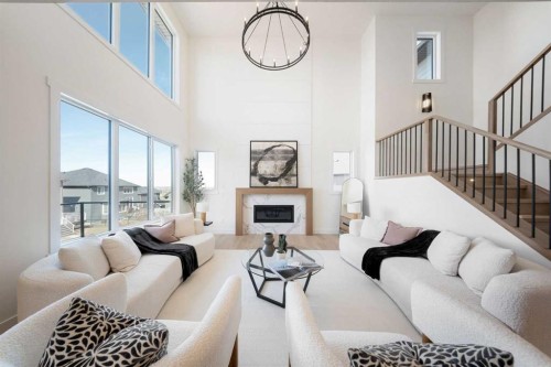 6 Westmount Point, Okotoks, AB - Indoor Photo Showing Living Room With Fireplace