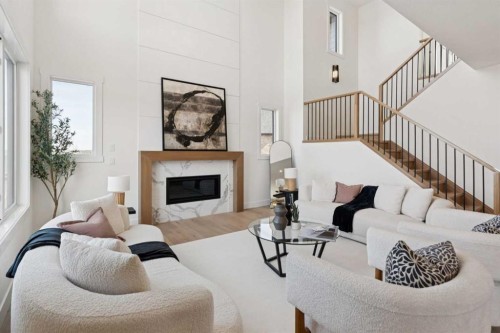 6 Westmount Point, Okotoks, AB - Indoor Photo Showing Living Room With Fireplace