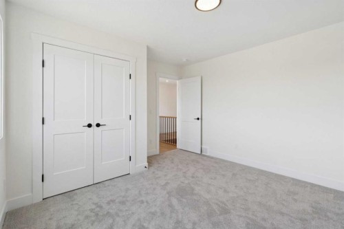 6 Westmount Point, Okotoks, AB - Indoor Photo Showing Other Room